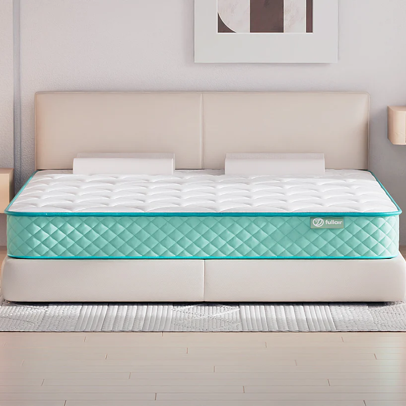 Mattress with a visible brand logo in a bedroom setting